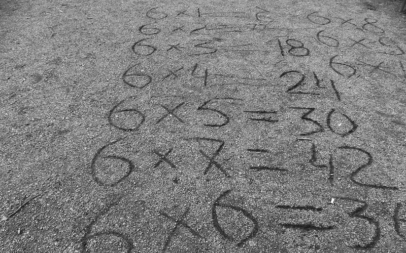 The six-times table chalked on the ground