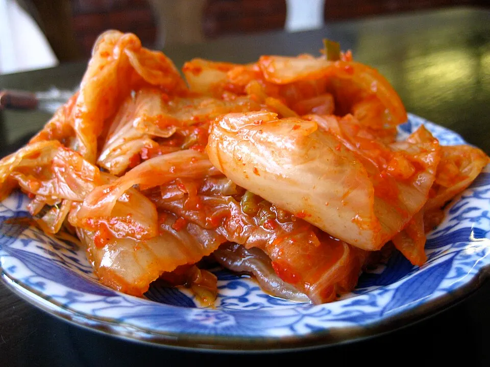 A dish of red chilli-coated fermented cabbage.