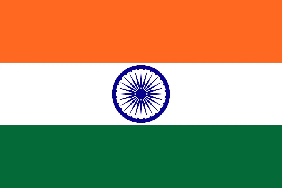 A horizontal tricolour flag with a blue wheel in the centre.
