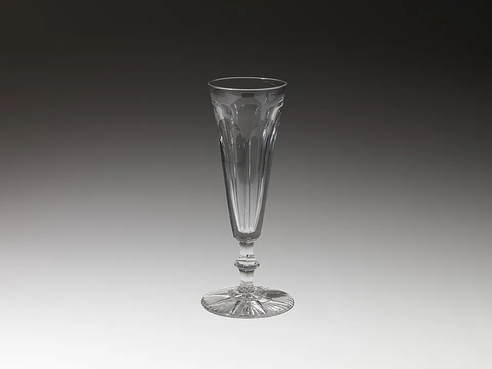 Tall glasses of sparkling wine with rising bubbles.