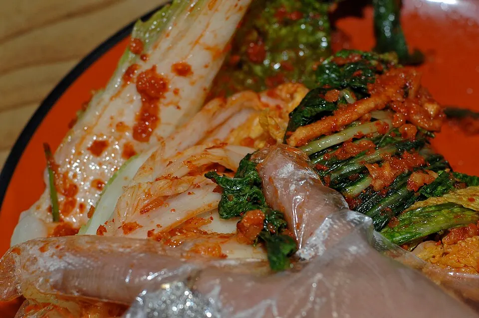 A dish of red chilli-coated fermented cabbage.