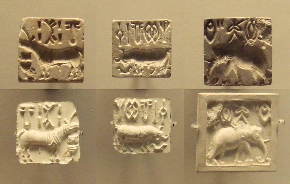 Six small square stone seals pressed in clay, each showing an animal and rows of tiny symbols.