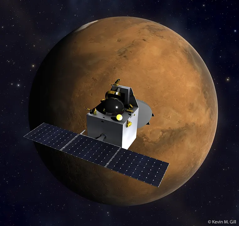An artist rendering of a small box-shaped spacecraft with solar panels in front of a rust-red planet.