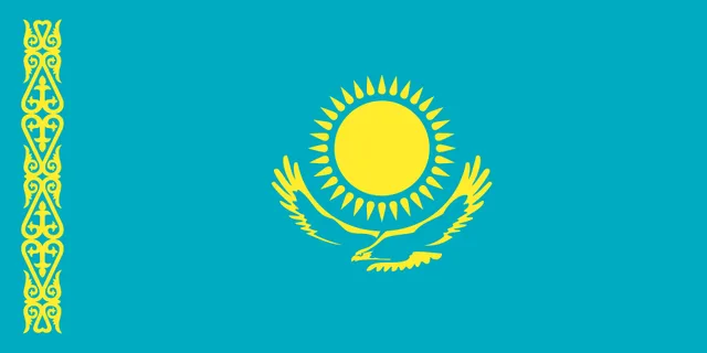 Turquoise flag with a gold sun, a gold bird and a gold pattern along the left edge