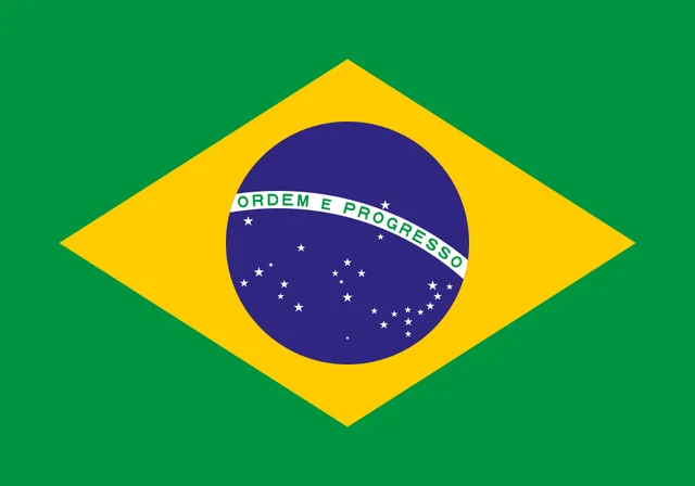 Green flag with a yellow diamond and a starry blue globe crossed by a white banner