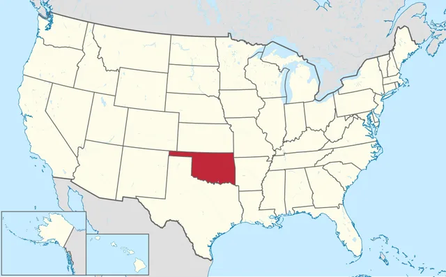 US map with a south-central state with a narrow strip extending west highlighted in red