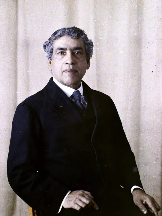 An old colour portrait of a man in formal clothes.